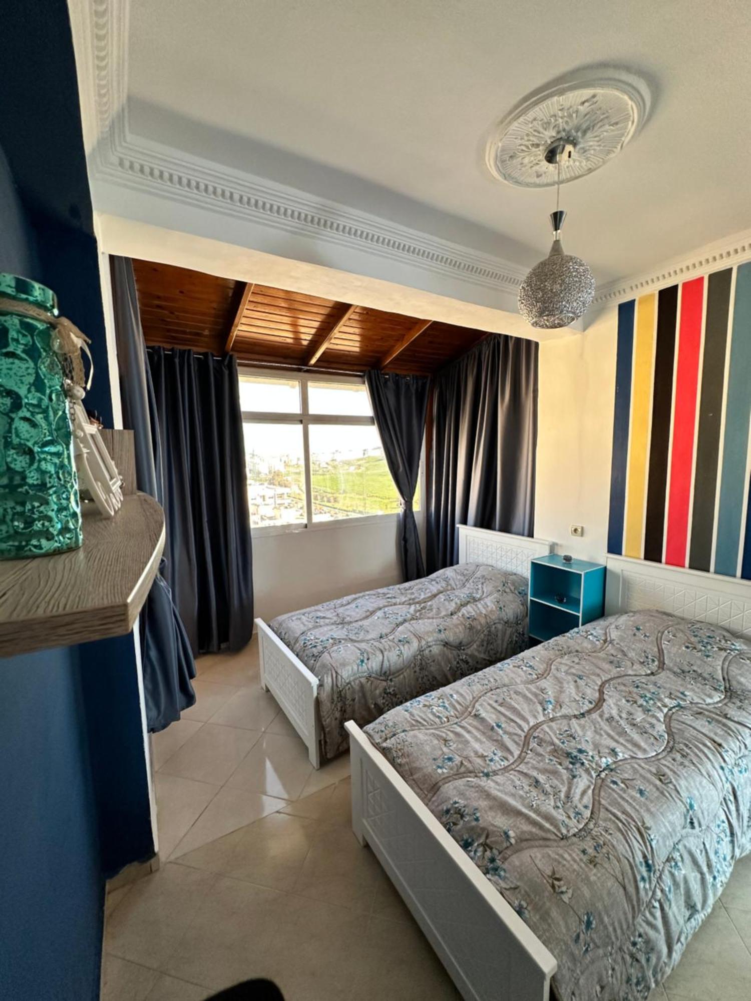 Appartement Almoustakbal Tanger Bagian luar foto
